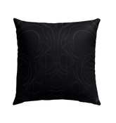 Daisy Chain Outdoor Pillow placed on an outdoor chair, enhancing the cozy garden ambiance.